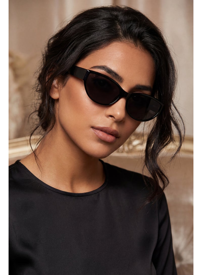 تصميم زينس نظارة شمسية نسائية بيضاوية بحماية UV400 – إطار أسود وعدسات سوداء - Image 5