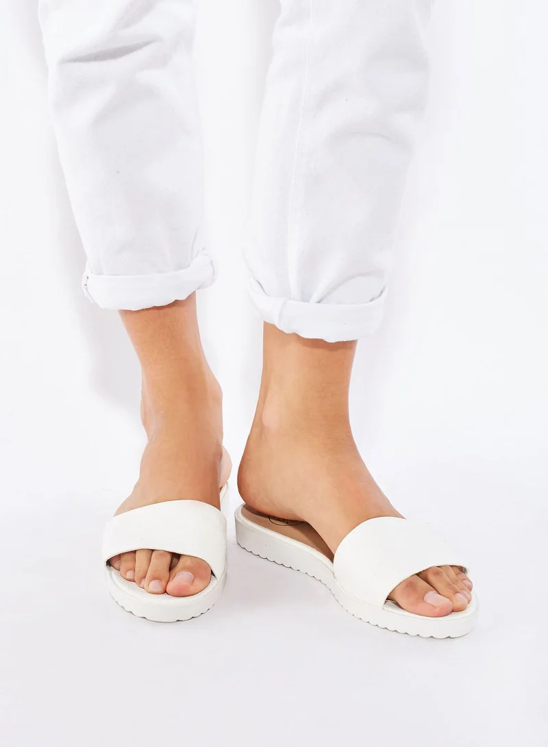 Coco Lizard Print Slide Sandals