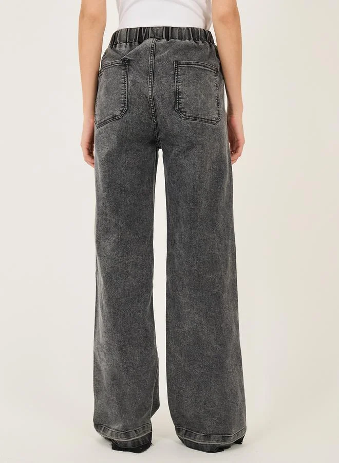 Styli High Rise Elasticated Waist Wide Leg Jeans with Frayed Hem
