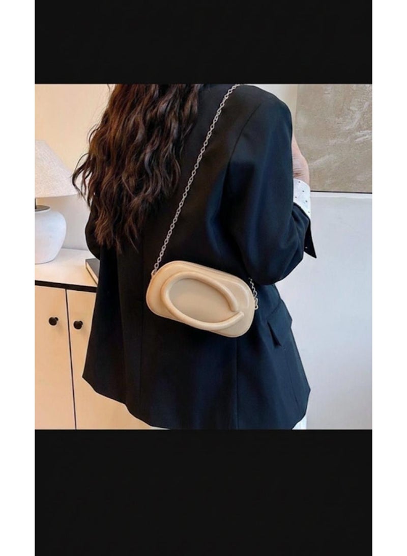 Trendy mini women’s bag made from durable high-quality silicone with a modern glossy design. Lightweight and easy to carry, featuring a stylish metal chain for crossbody or shoulder wear. Small yet practical, perfect for daily outings and adding a chic modern touch to any outfit. - Image 2