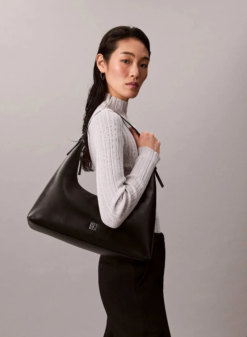 Calvin Klein Black Monogram Logo Emblem Leather Shoulder Bag for Women | Best Price UAE