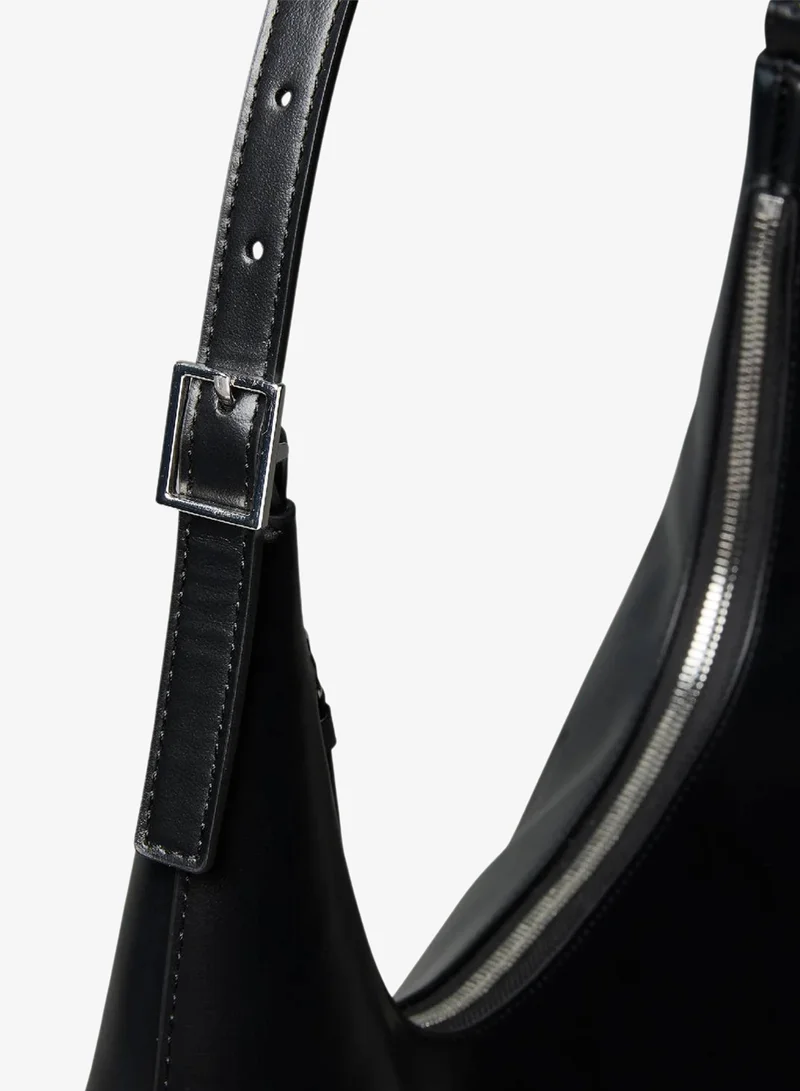 Calvin Klein Black Monogram Logo Emblem Leather Shoulder Bag for Women | Best Price UAE