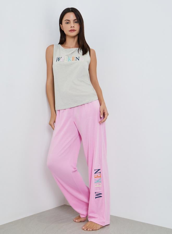 A pajama set of pants and sleeveless blouse with l...