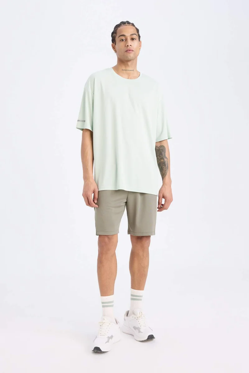 ديفاكتو DeFactoFit Boxy Fit Crest Printed Sports T-Shirt