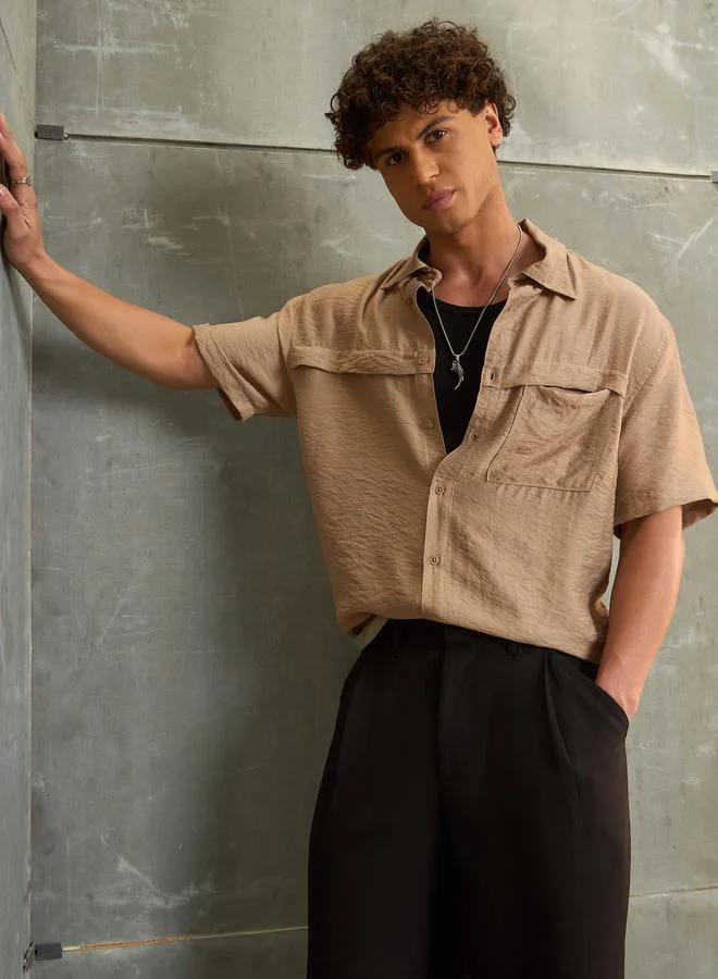 ساسافراس قميص رجالي بيج بقصة مريحة من ساسافراس