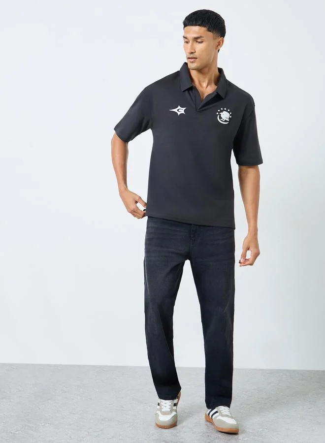 ستايلي تيشيرت بولو واسع بطبعة جرافيك