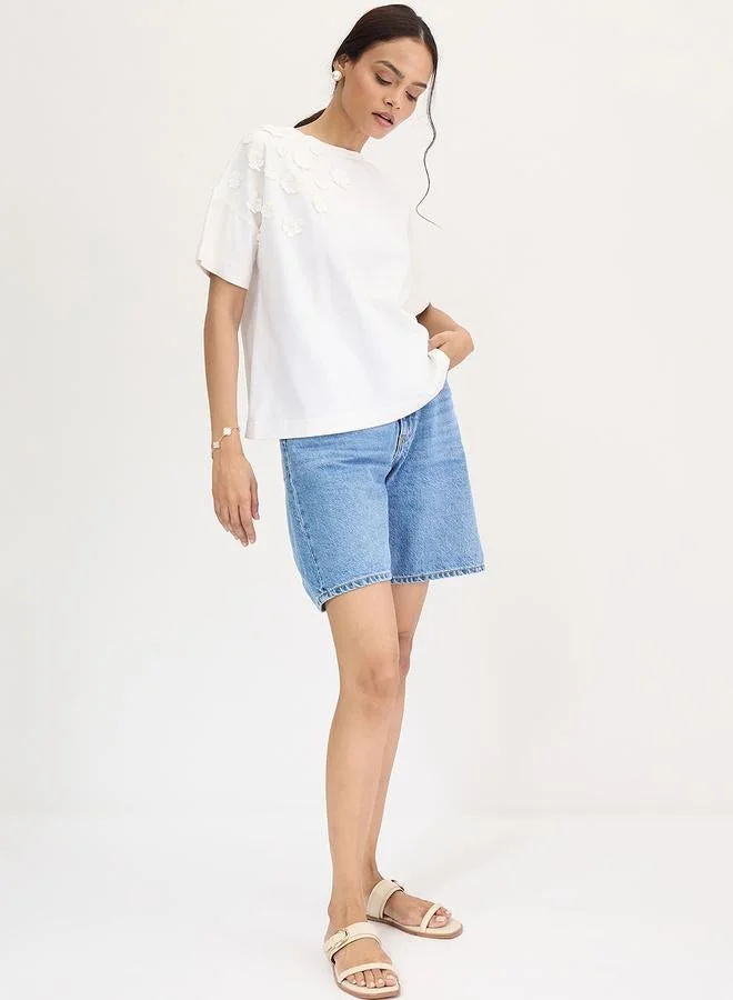 Femmella  Femmella White Flower Patch Detail T-Shirt for Women | Best Price UAE