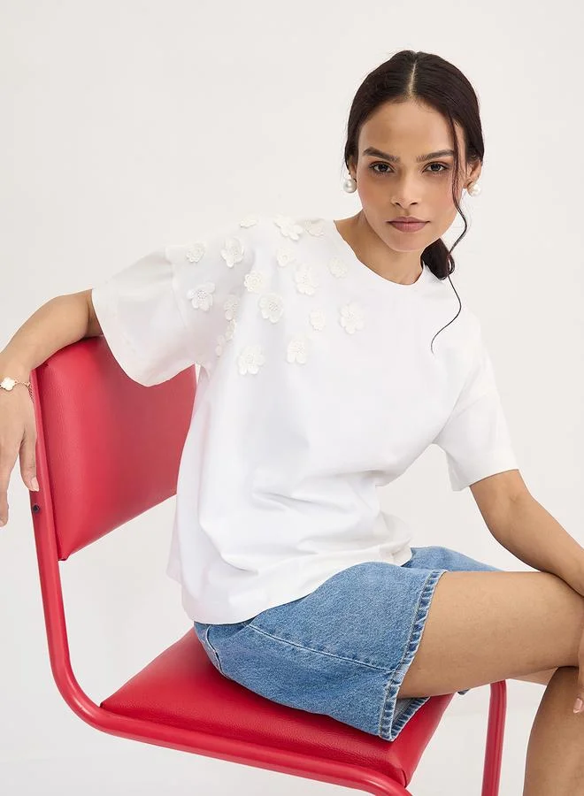 Femmella  Femmella White Flower Patch Detail T-Shirt for Women | Best Price UAE