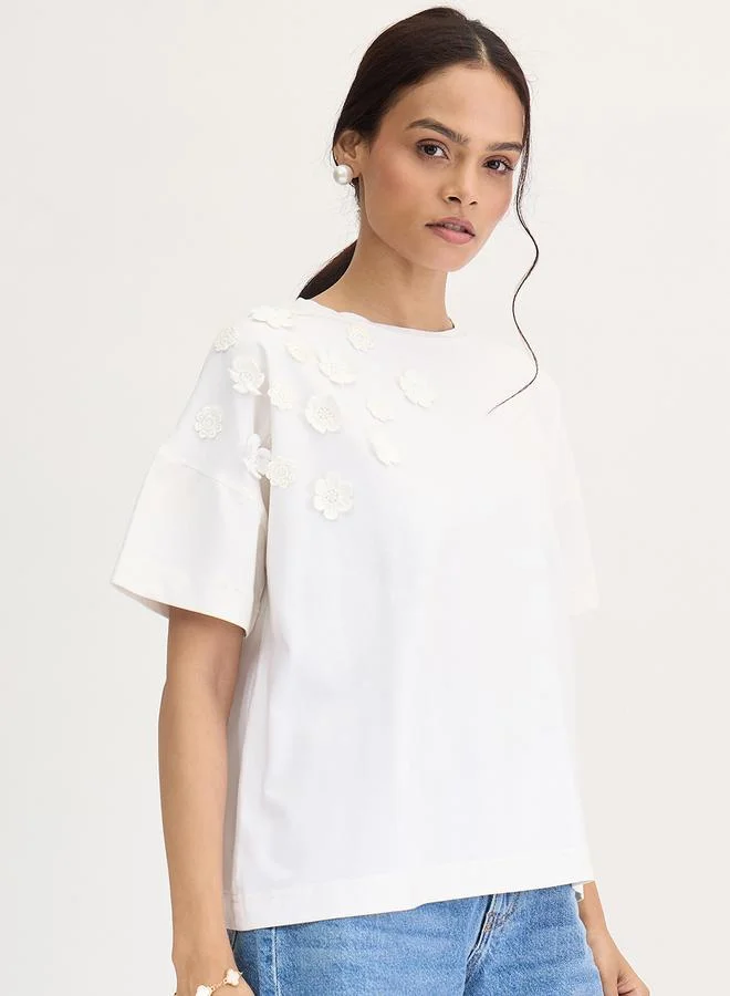 Femmella  Femmella White Flower Patch Detail T-Shirt for Women | Best Price UAE
