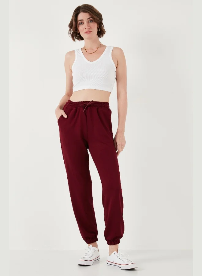 ليلا بنطلون رياضي نسائي من أويشو بقصة عادية من قماش ليلى مطاطي