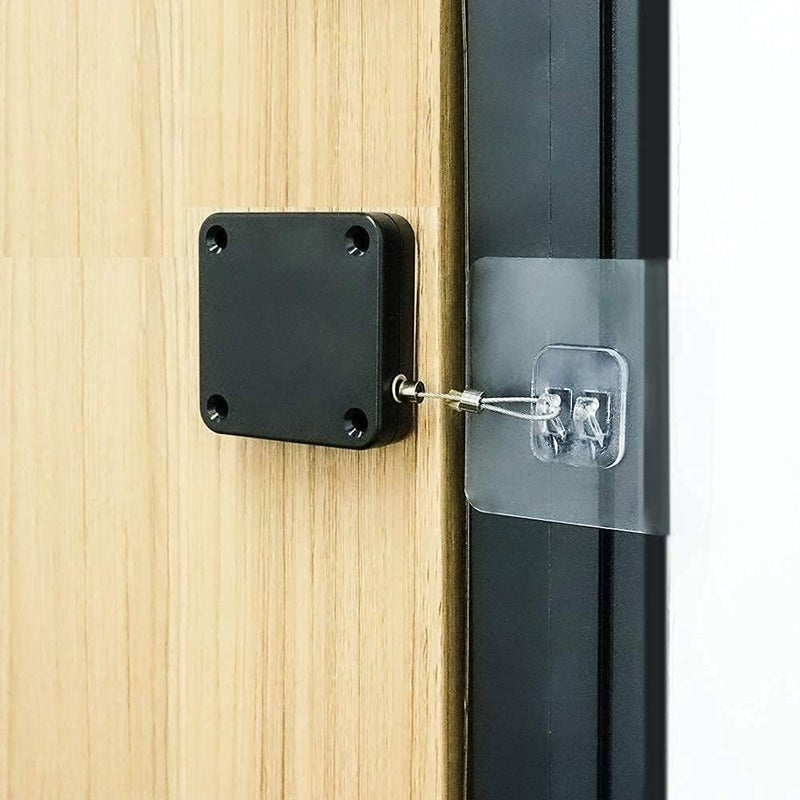 Whitecloud TRANSFORMING HOMES Whitecloud TRANSFORMING HOMES Automatic Door Closer Effortless Door Control with Drawstring Mechanism for Interior Storm DC002 Black Pack of 1  - Image 1