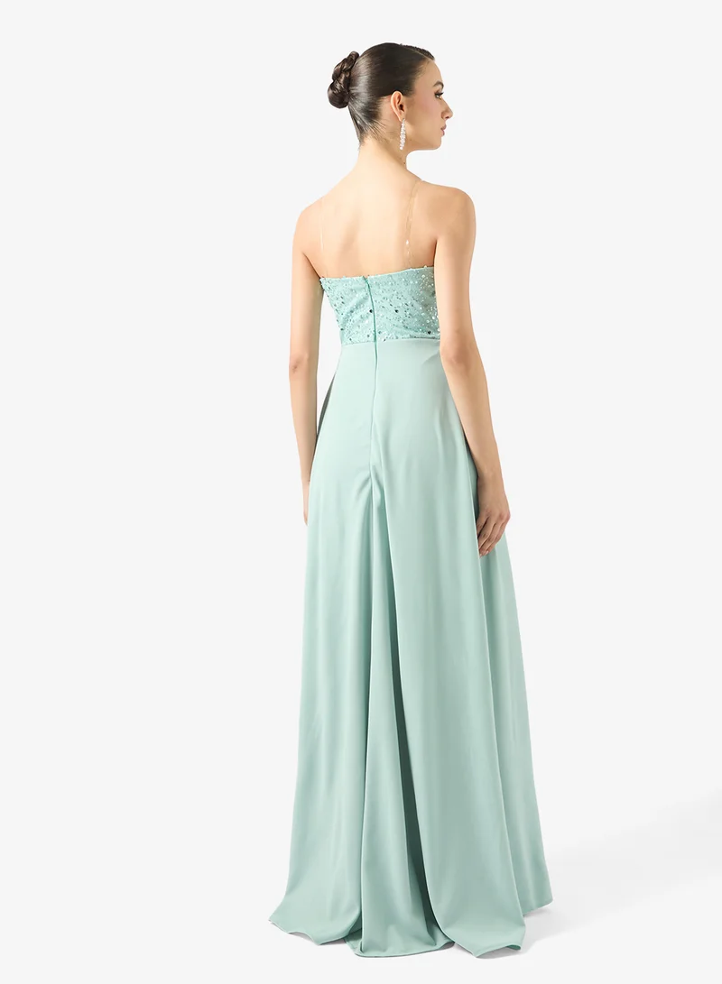 نمشي x فستان سهرة مطرز الصدر والذيل