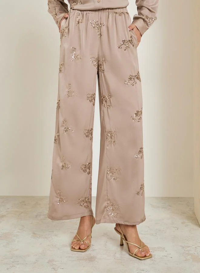 Styli Women Beige Embellished Wide Leg Trousers