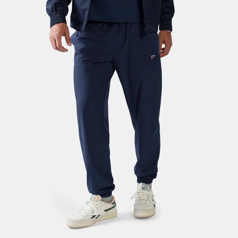 ريبوك Heritage Logo Track Pants