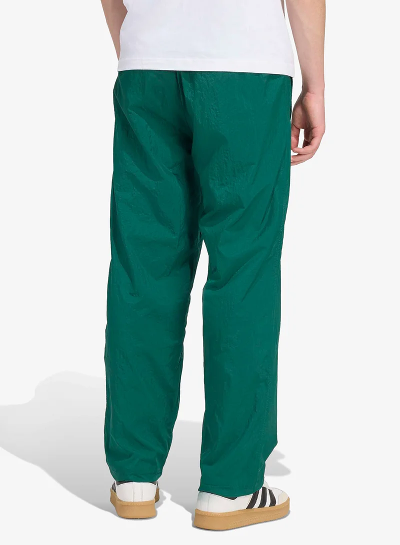 اديداس اوريجينالز بنطلون رياضي فضفاض للشباب