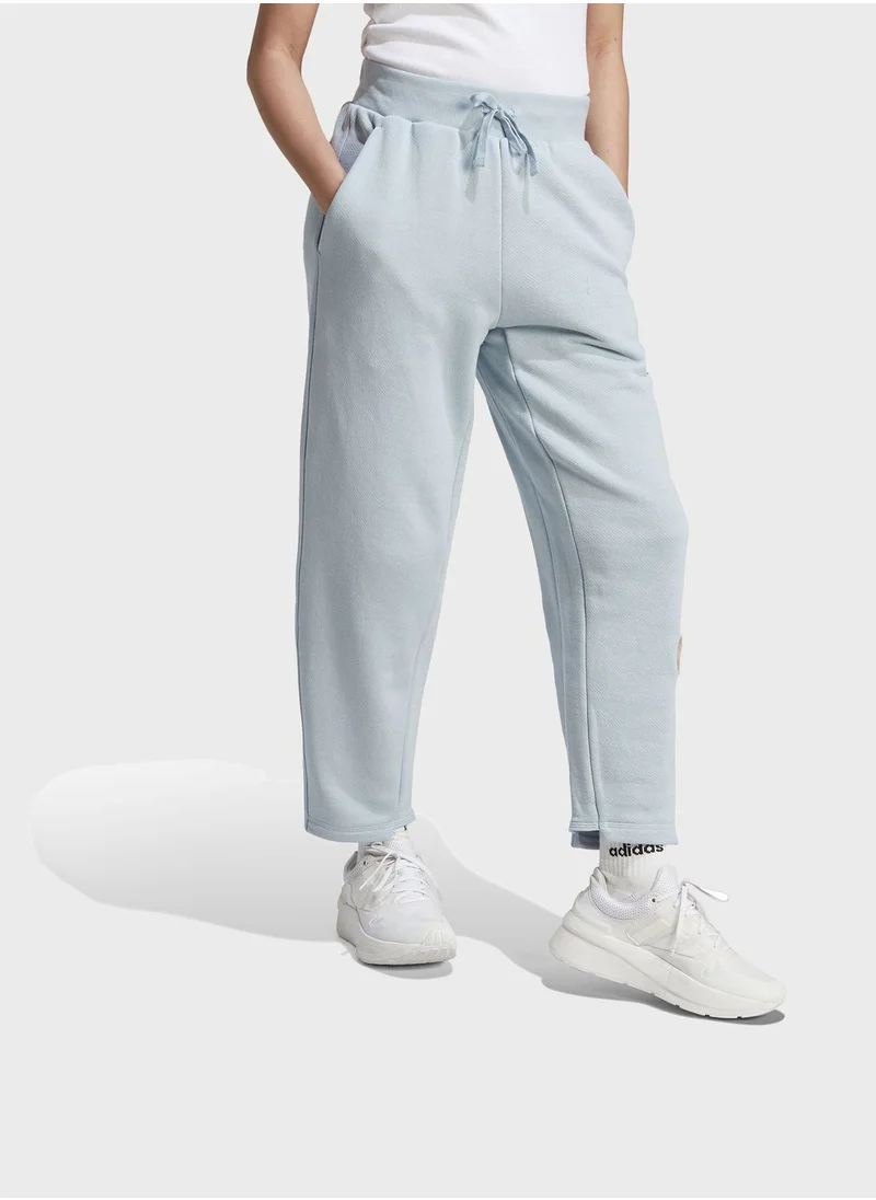 اديداس بنطال بأرجل واسعة Lounge French Terry