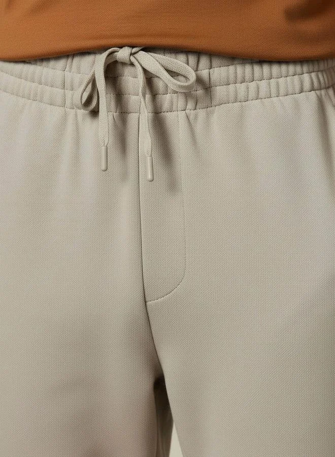 Splash FAV BEIGE Basics Regular Fit Joggers with Elasticated Waist for Men | Best Price UAE