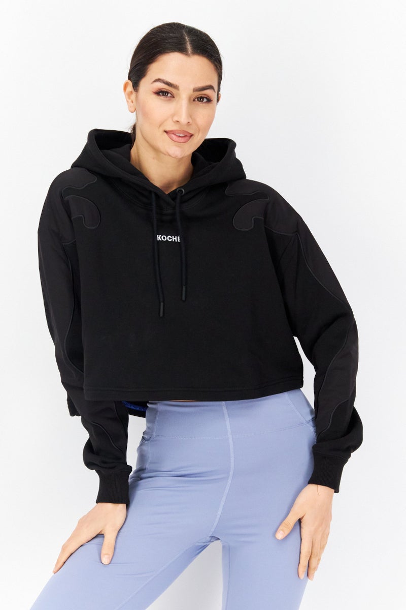 PUMA هودي قصير مزين بالتطريز للنساء من بومة x كوش، أسود - Image 1