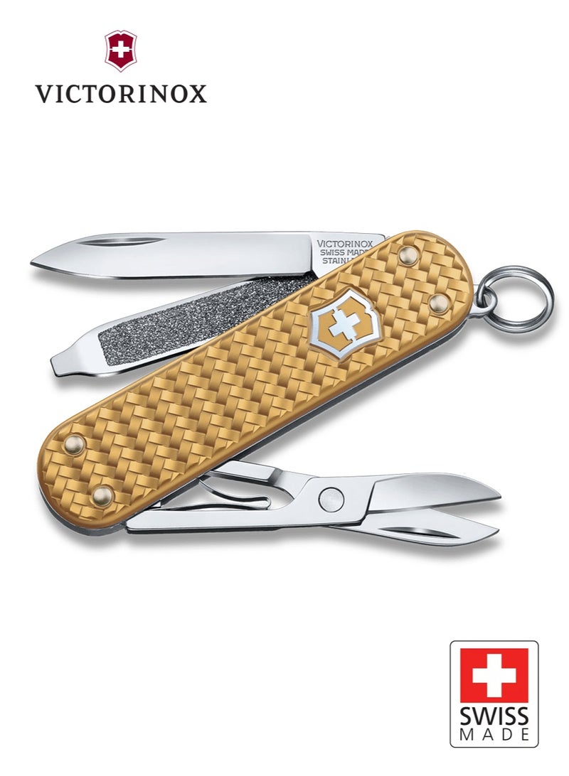 Victorinox Classic SD Precious Alox Brass Gold 0.6221.408G | Sleek Swiss Army Knife with Luxurious Alox Design | Multi-Functional Tool for Everyday Carry and Outdoor Adventures - Image 1