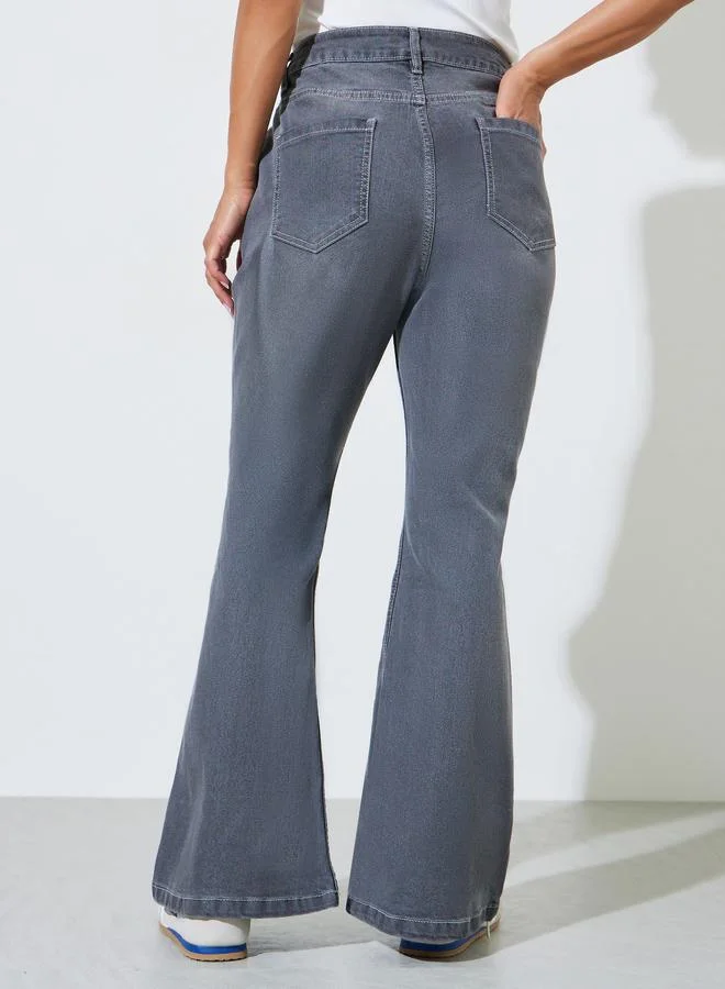 Styli  Grey Faded Stretch Flared Jeans for Women | Best Price UAE