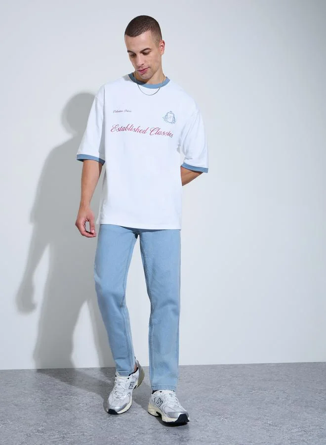 Styli Men White Graphic Print Contrast Trim Oversized T-Shirt