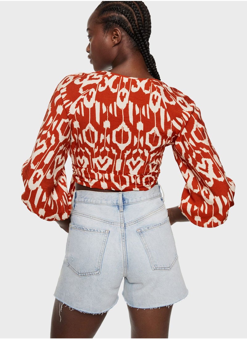 Surplice Neck Printed Puff Sleeve Crop Top - pzsku/Z641DE093F06852491E18Z/45/_/1698930766/15775e7a-d98c-49de-99f0-71f3a83fa81a