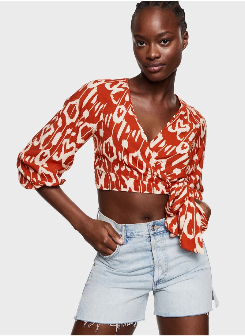 Surplice Neck Printed Puff Sleeve Crop Top - pzsku/Z641DE093F06852491E18Z/45/_/1698930767/72e4a73f-ca72-41bf-b076-eb1e4b33f917