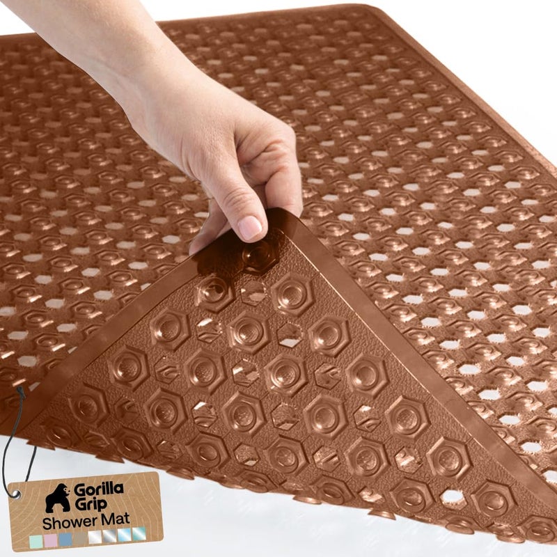 GORILLA GRIP Patented Bath Tub Shower Mat, Machine Washable Bathtub Floor Liner Mats, Suction Cups and Drain Holes to Keep Tubs Clean, Soft on Feet, Bathroom Essentials, 35x16 Inch, Brown - Image 1