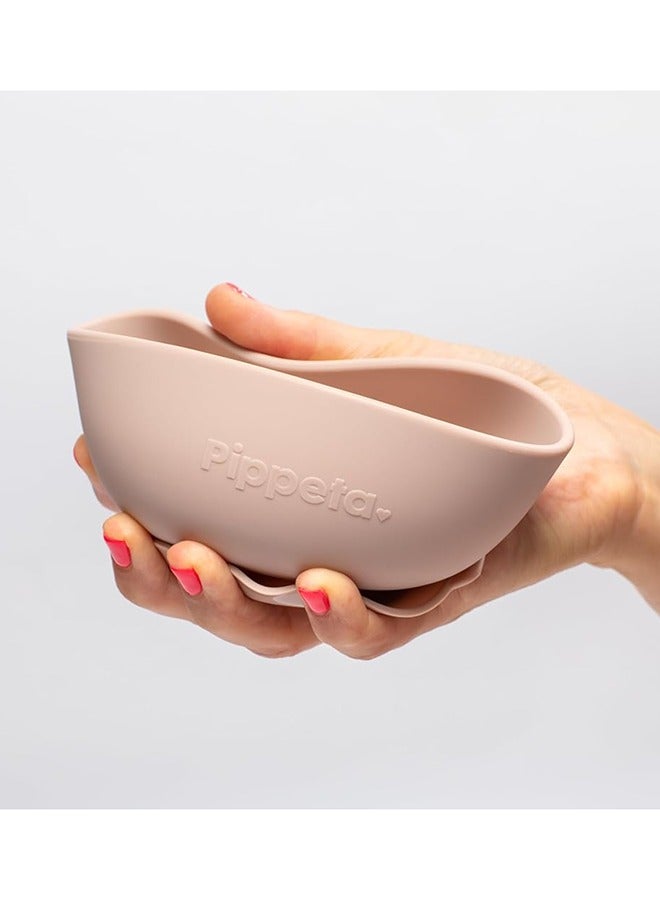 Pippeta The Pippeta Silicone Suction Bowl is designed to make mealtimes cleaner, easier, and more enjoyable for both babies and parents. Its strong suction base helps keep the bowl firmly in place, reducing spills and mess during feeding. Made from BPA-free, food-grade silicone, it is safe, soft, and durable for everyday use. The unbreakable design makes it ideal for little ones learning to eat independently. Easy to clean and highly convenient, it is both microwave and dishwasher safe. A practical feeding essential for stress-free, mess-free mealtimes. - Image 4