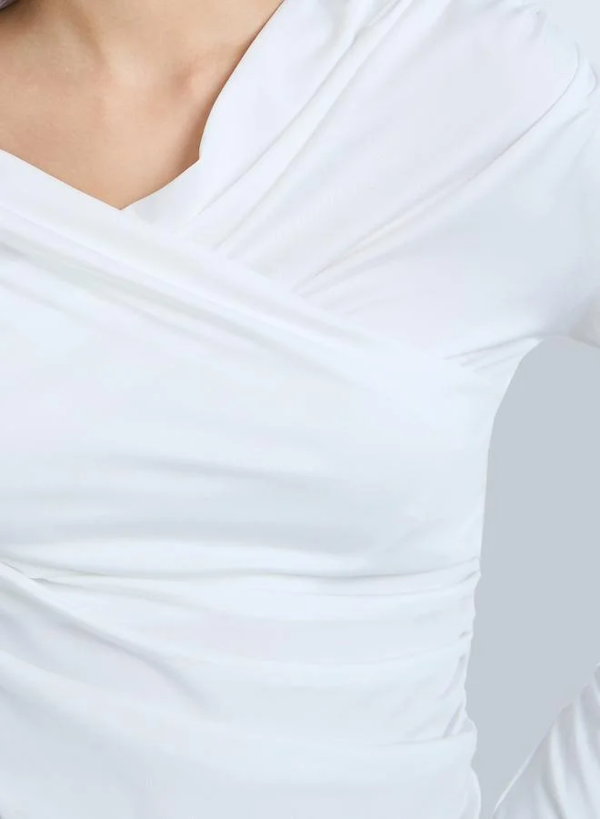 تايك تو بلوزة بأكمام طويلة ملفوف