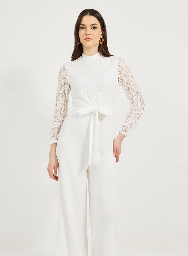 Styli Texture Lace Insert Wide Leg Jumpsuit with Waist Tie Detail