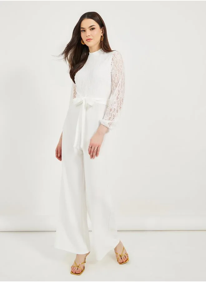 Styli Texture Lace Insert Wide Leg Jumpsuit with Waist Tie Detail