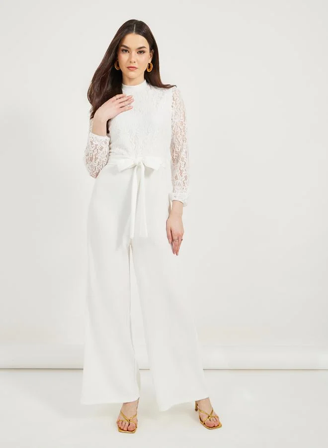 Styli Texture Lace Insert Wide Leg Jumpsuit with Waist Tie Detail