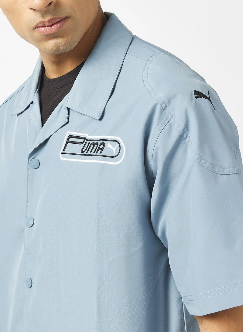 PUMA  Future.Archive Graphic Boxy Racer Shirt for Men | Best Price UAE
