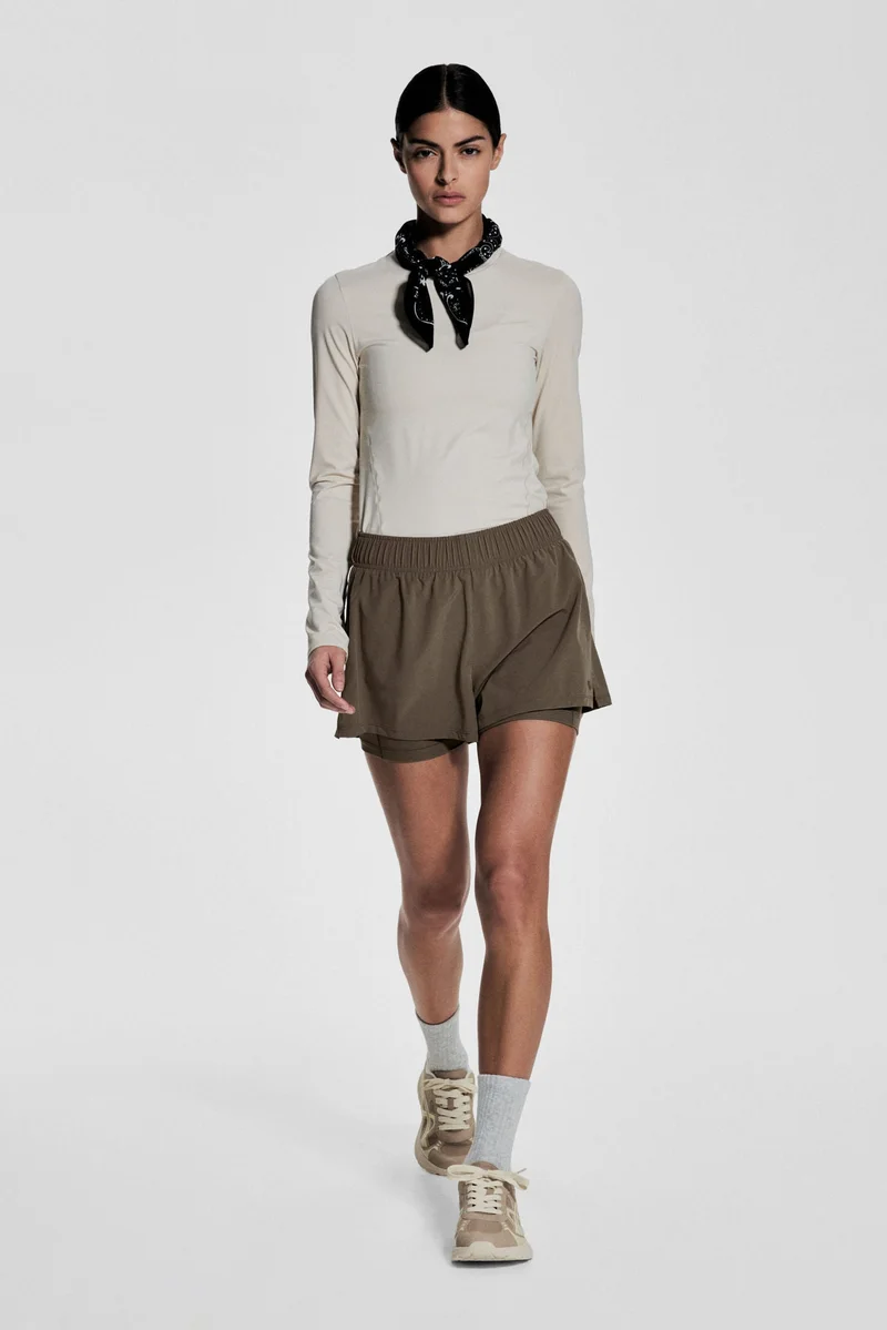 اتش اند ام جاكيت ركض مزدوج الطبقات من قماش دراي موف