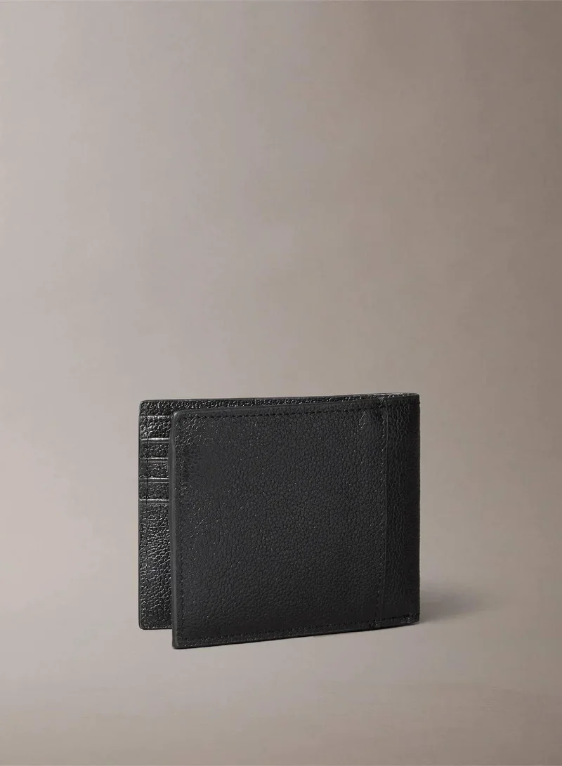 كالفن كلاين محفظة ثنائية الطي من الجلد بتقنية RFID