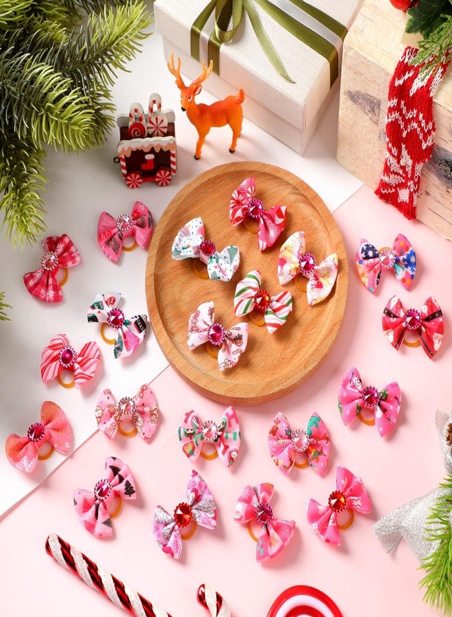 تونديامو مجموعة تونديمو من 100 قطعة من ربطات شعر الكلاب الوردية لعيد الميلاد مع أربطة مطاطية، مزينة بأحجار الراين الحمراء والبنفسجية، لتزيين شعر الجراء، على شكل عقدة علوية، مزينة بزينة شجرة الحلوى، وزينة سانتا ورنة، وإكسسوارات شعر للحيوانات الأليفة للفتيات الصغيرات. - Image 4