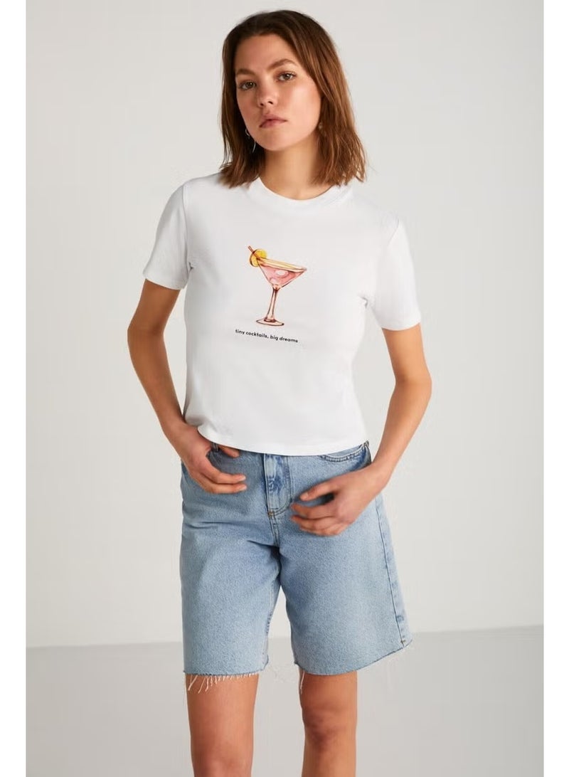 GRIMELANGE Ivonne Women's Cocktail Print Patterned Short Sleeve Organic Cotton Crew Neck Crop White T-shirt - Image 2