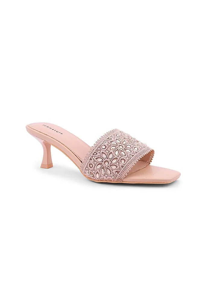IconStyle Elegant heel slipper featuring delicate pearl details.