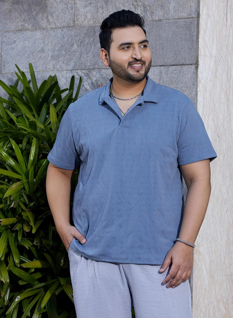 انستافاب بلس تيشيرت بولو رجالي أزرق فاتح بنقوش عروق ملمسية مقاس بلس للملابس الكاجوال