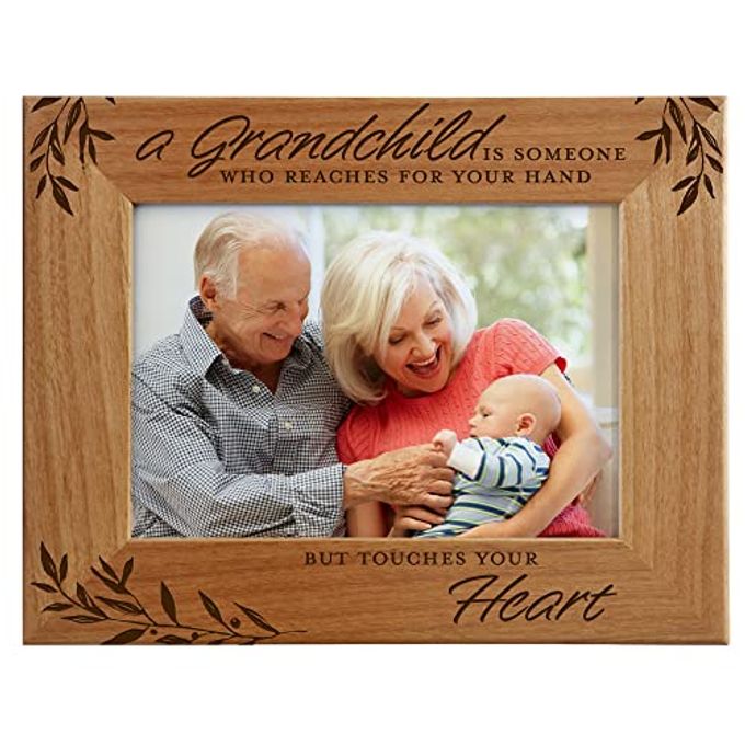 GRANDPARENT GIFTS A GRANDCHILD IS SOMEONE WHO REACHES FOR YOUR HAND BUT TOUCHES YOUR HEART NEW GRANDPARENT GIFTS FIRST TIME GRANDMA FRAME ENGRAVED WOOD PHOTO FRAME FITS 5X7 HORIZONTAL PORTRAIT