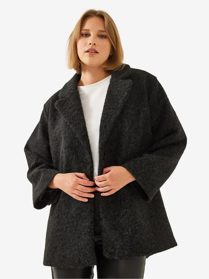 بيانكو لوتشي معطف لوكسي فخم بياقة شال وجيب