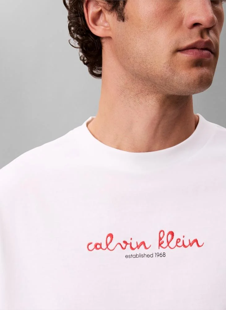 Calvin Klein Jeans Bright White Line Logo Graphic Relaxed T‑Shirt for Men | Best Price UAE
