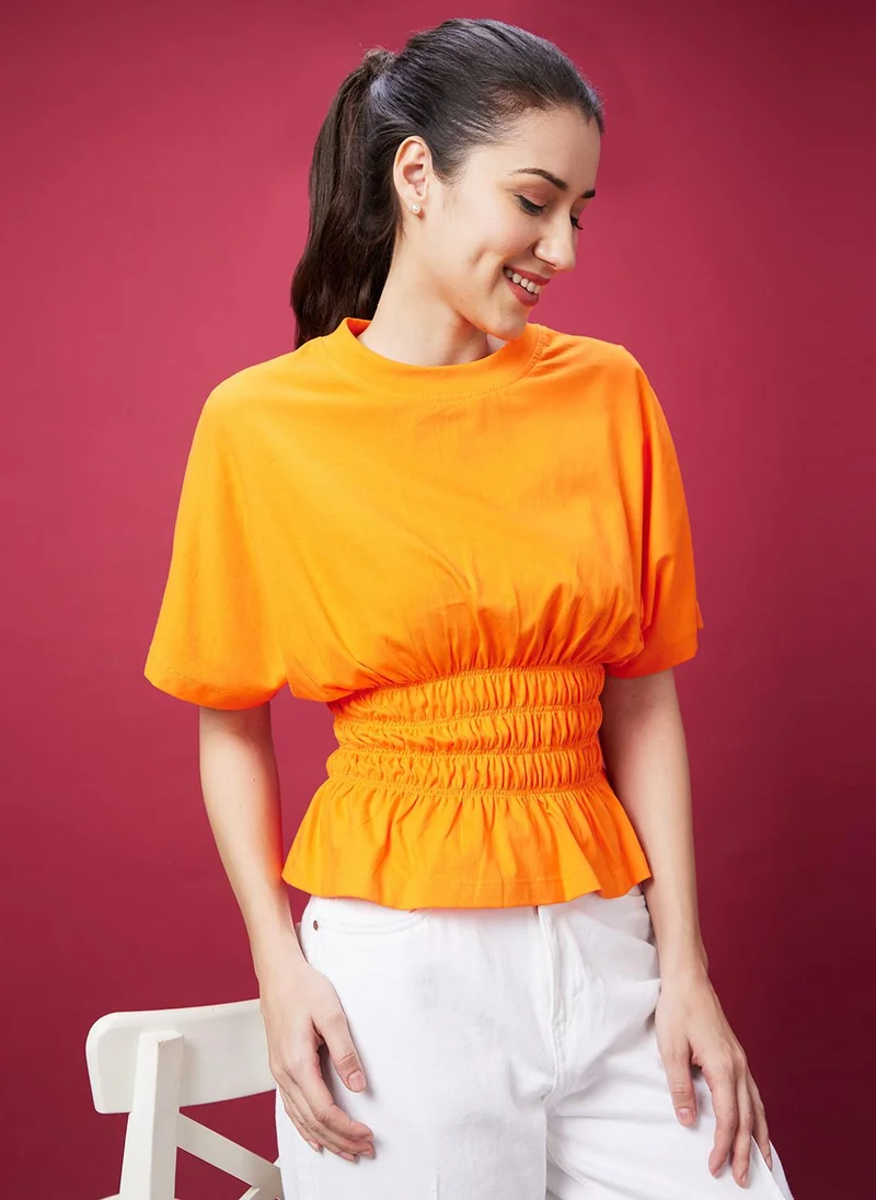 جلو باص بلوزة قطنية نسائية بأكمام واسعة برتقالية وخصر مطاطي