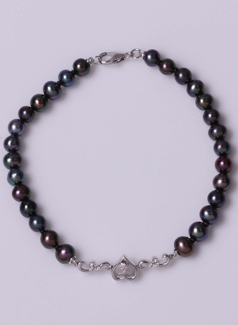 MIKURA Bracelet 1st 19cm, Freshwater Pearls, A Quality, Treated Black Color, 5.5-5.0MM, 12D-0.01Cts, 18KW  - Image 1