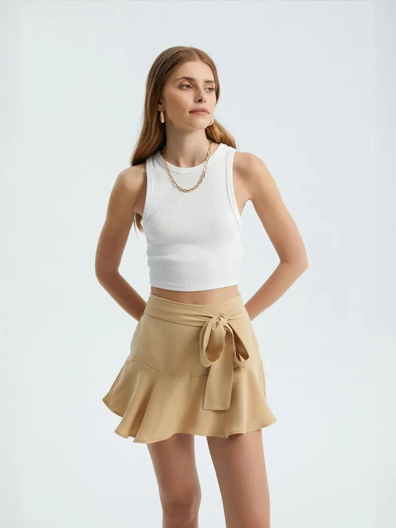 HICCUP High Waist Tie Front Ruffle Mini Skirt