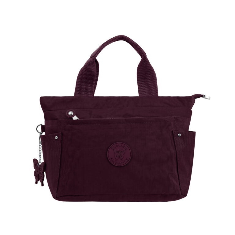 مجموعة كابريس حقيبة كتف صغيرة للجنسين – بلون البرقوق الأحمر، نايلون مقاوم للماء، سعة 9.5 لتر - Image 1