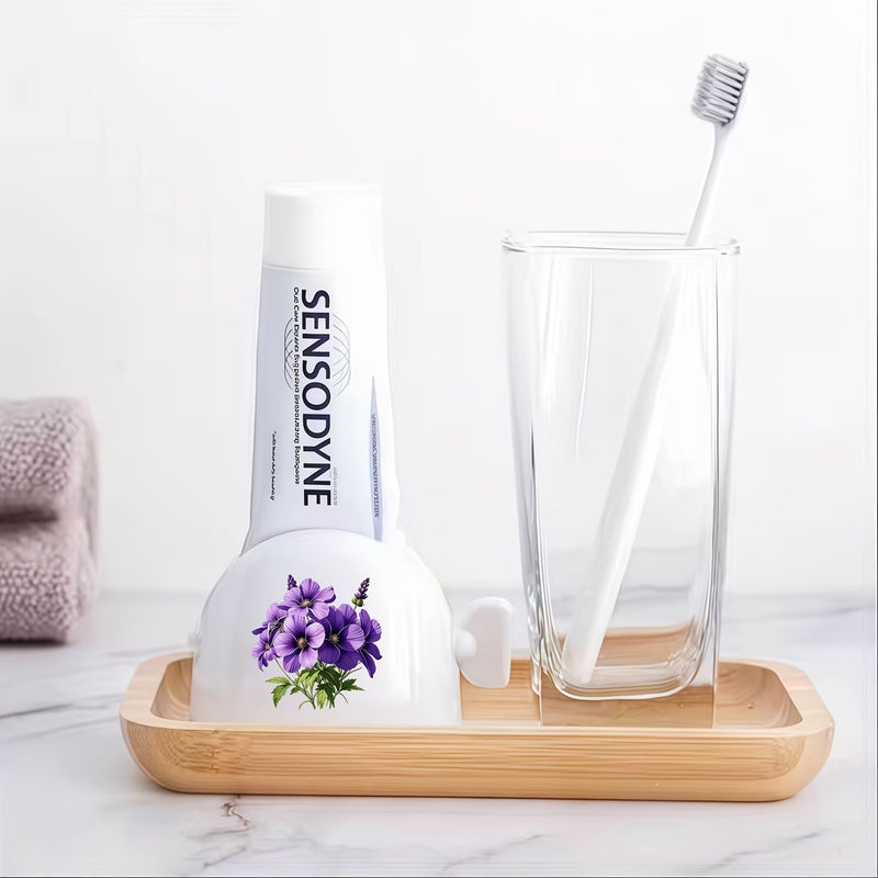 Purple Floral Pattern Easy Squeeze Toothpaste Dispenser Manual Bathroom Accessory - Image 1