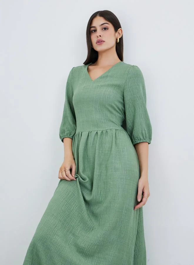 ستايلي فستان ماكسي بأكمام 3/4 بتصميم ذاتي من Styli Green