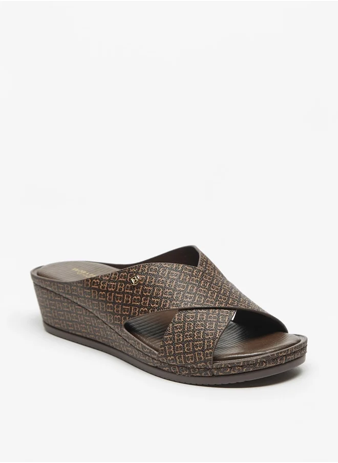 فلورا بيلا من شو إكسبرس Logo Print Cross Strap Slip On Sandals with Wedge Heels